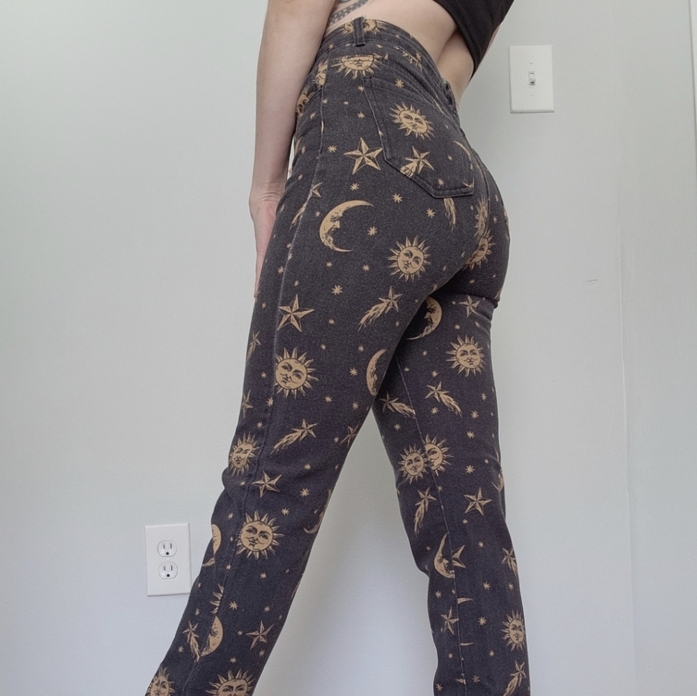 Cute sun, moon, and star high-rise, straight-leg jeans.
